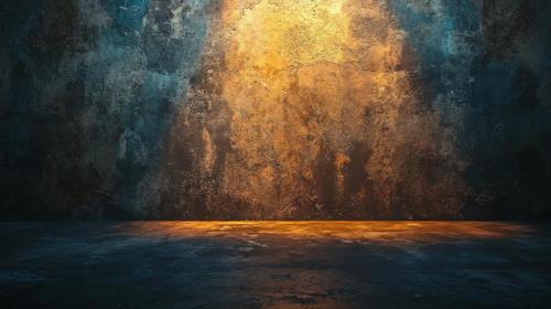 Dark room with a wall that has a yellow spot on it. The room is